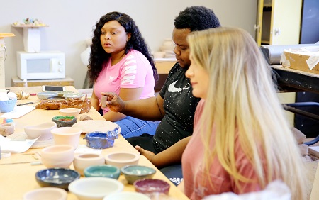East Mississippi Community College students in art instructor Terry Cherry’s class work on pottery that will be for sale during the college’s Fine Arts Holiday Celebration Nov. 27. The students are, from left, Ciara Darden, Brandon Holmes and Jenna Brooke Hailey. East Mississippi Community College students in art instructor Terry Cherry’s class work on pottery that will be for sale during the college’s Fine Arts Holiday Celebration Nov. 27. The students are, from left, Ciara Darden, Brandon Holmes and Jenna Brooke Hailey.
