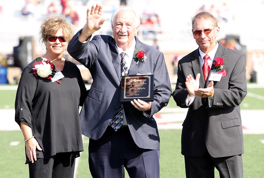 East Mississippi Community College Community College named Nashville, Tenn., resident John Apple, at center, the 2018 Alumnus of the Year Saturday, Oct. 13, during halftime of the college’s Homecoming game against Holmes Community College. Apple was presented with the award by EMCC Director of Alumni Affairs and Foundation Operations Gina Cotton, at left, and EMCC Alumni Association President Craig Hitt, at right. East Mississippi Community College Community College named Nashville, Tenn., resident John Apple, at center, the 2018 Alumnus of the Year Saturday, Oct. 13, during halftime of the college’s Homecoming game against Holmes Community College. Apple was presented with the award by EMCC Director of Alumni Affairs and Foundation Operations Gina Cotton, at left, and EMCC Alumni Association President Craig Hitt, at right.